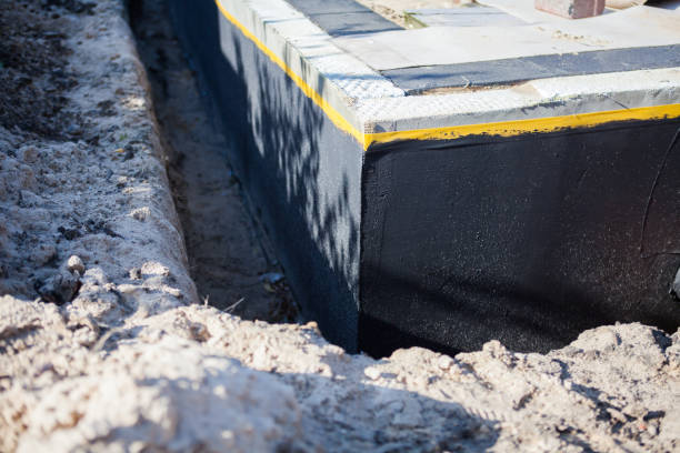 Professional Waterproofing technician working in Jefferson, MD